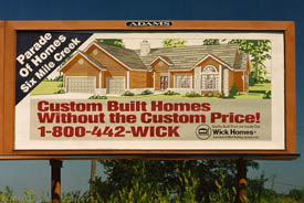 Wick Homes billboard cira 1990.