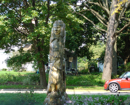 Effigy Tree by local Native American Harry Whitehorse transformed from a old hackberry tree that was struck by lightening.  Located at lakeland Ave. and Maple St. on the northeast shore of Lake Monona  in Madison, Wisconsin